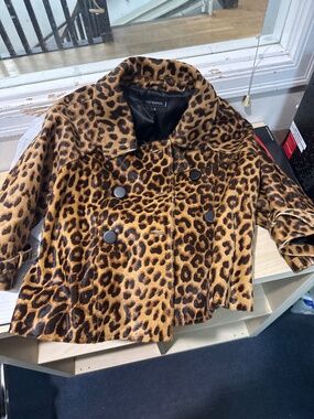 A leather jacket ( tiger print )